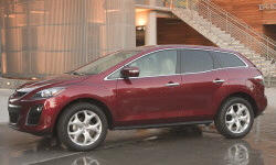 Mazda CX-7 vs. Pontiac Torrent Fuel Economy (km/L)