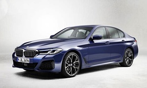Lincoln MKZ vs. BMW 5-Series Fuel Economy (km/L)