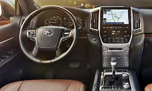 Hyundai Genesis Coupe vs. Toyota Land Cruiser V8 Fuel Economy (g/100m)