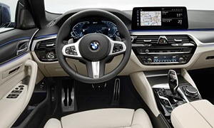 Lincoln MKZ vs. BMW 5-Series Fuel Economy (g/100m)