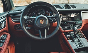 Porsche Macan vs. Cadillac DTS Fuel Economy (km/L)