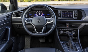 Volkswagen Jetta vs. Buick Enclave Fuel Economy (g/100m)